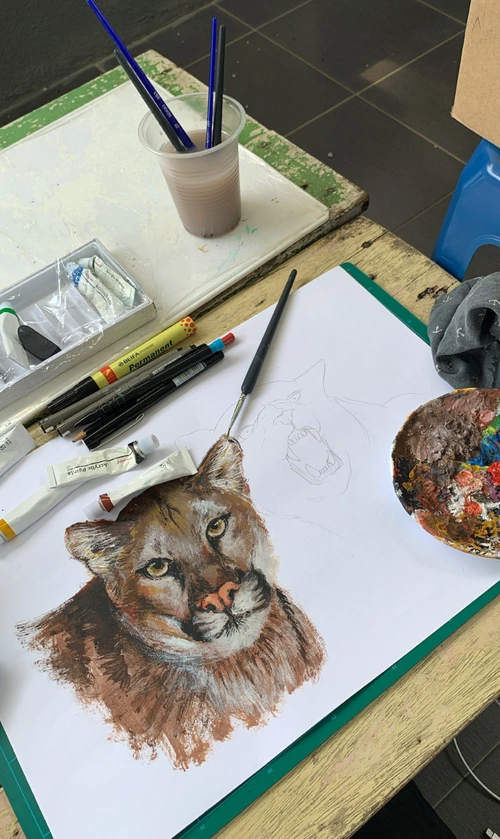 A cat painting in progress